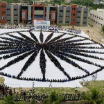 THE HUMAN CHAIN -“ASHOKA CHAKRA” The Rotract Club of Porbandar and The Porbandar Yuva District Chamber of Commerce from Porbandar, Gujarat, have made a historical human chain in the shape of ASHOKA CHAKRA (radius 95 feet) being a symbol of unity, comprising of 3799 students. The event was held at Dr. V. R. Godhaniya College campus as on August 15, 2015. Record Category: Mass Record